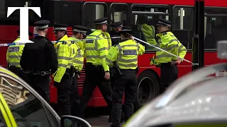 Pedestrian killed as double-decker crashes into London bus stop