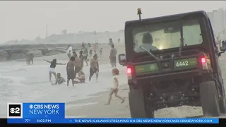 Man pulled out of water at Rockaway Beach, rushed to hospital