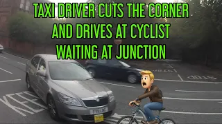 Taxi Driver Cuts the Corner and Drives at Cyclist Waiting at Junction