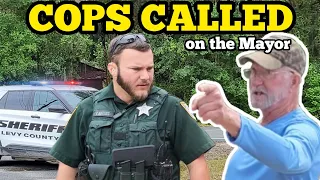 COPS CALLED ON MAYOR