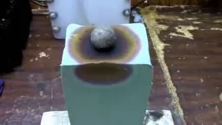 Placing a hot nickel ball on a Floral Foam