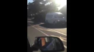 Taxi driving backwards on Kommetjie Road