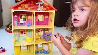 Helena Prented Playing with New Toy Peppa Pig's House