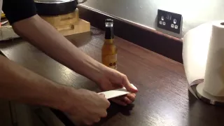 How to open a bottle of beer with a sheet of paper