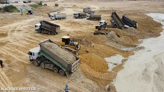 Impressive Dump Truck Unloading Dirt Delete Mud With Bulldozer Spreading Dirt