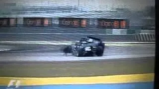 accidente de fisichella y webber malasia 2005.avi