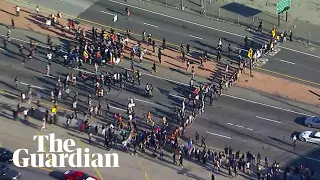 George Floyd: aerial footage shows protesters block LA highway