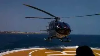 Helicopter landing on yacht