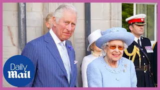 The Queen cracks jokes with Prince Charles in Scotland