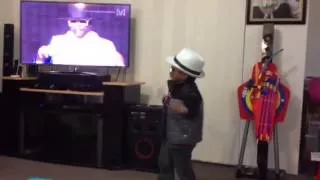 Mini Justin B and Will I am performs that power