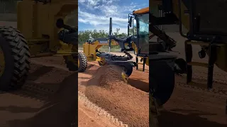 John Deere 772GP Grader moving soft NT dirt