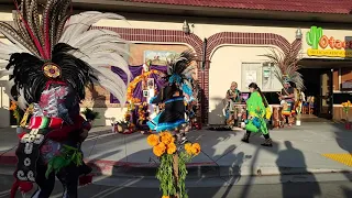 Aztec Dancers at the 2021 Fruitvale Dia de Los Muertos celebration in Oakland,  California