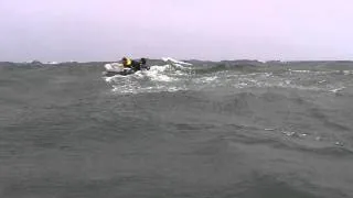 2 Inflatable boats in big swells.