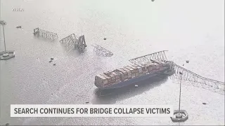 Francis Scott Key Bridge in Baltimore collapses after ship strikes it, sending vehicles into water