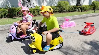 Ali and Adriana Bike Ride on Power wheels and Inflatable Toys