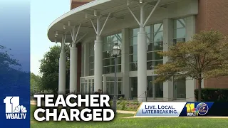 Teacher charged with rape, sex abuse of two students