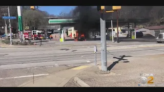 Fire Destroys Car At Gas Station