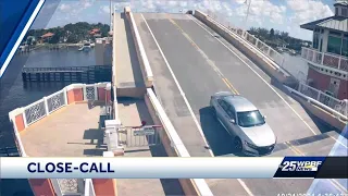 WATCH: Lantana Intracoastal bridge goes up with car still on it; bridge tender fired