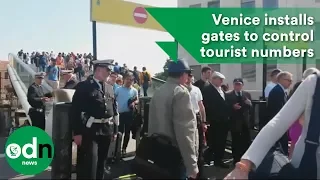 Venice installs gates to control tourist numbers