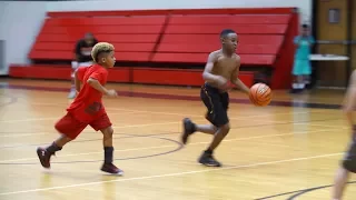 This kid could probably beat you in basketball. He just finished third grade.