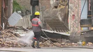 Demolition Crew On Site Of Building Collapse