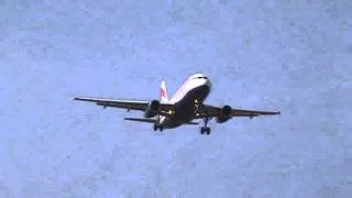 British Airways Airbus A319-131 G-EUPT Landing At London Heathrow On Runway 09L On 29/03/2014