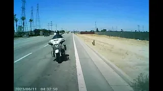 Dashcam footage shows Bakersfield police motorcycle officer colliding with stalled car