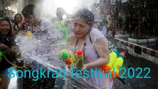 Songkran festival in Bangkok Thailand in 2022 in front of Central world luxury shopping mall.