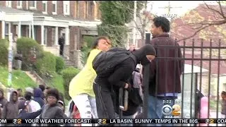 Caught On Video: Mother Drags Son Away From Baltimore Riots