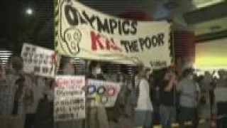 Anti-Olympics protesters react to opening of Games