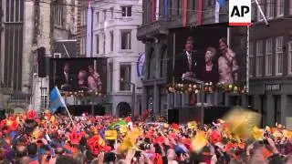 King Willem-Alexander and Queen Maxima appear on palace balcony