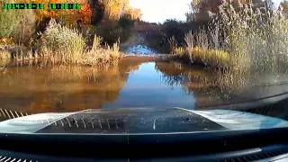 White Trailhawk water fording filmed from inside the car