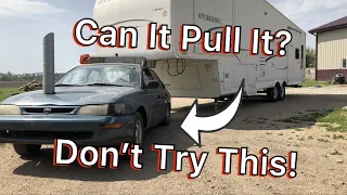 Car Pulling Fifth Wheel Camper