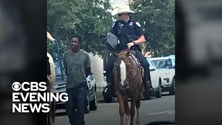 Picture of officers leading black man by rope sparks outrage