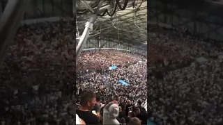 Marseille fans sending firework to Frankfurt fans