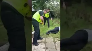 Moment police officer tasers 14-year-old boy after 'neighbour dispute' #shorts