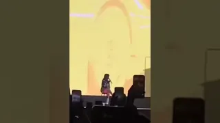 Billie Eilish laughing because of the wrong visuals while performing