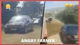 Moment angry farmer covers Mercedes Benz in SLURRY
