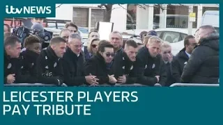 Leicester City players pay their respects outside the King Power stadium| ITV News