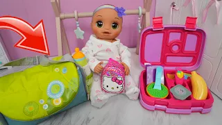 Baby Alive baby doll packing baby bag and lunchbox for daycare