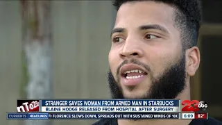Hero who saved woman from armed man released from hospital