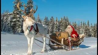 Christmas departure of Santa Claus: reindeer ride in Lapland Finland of Father Christmas