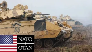 NATO's Firepower on Display: M1A2 Abrams and Combat Vehicles in Poland