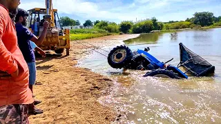 New holland tractor fell into pond and pulling out by cat jcb | tractor | | jcb | | jcb tractor |