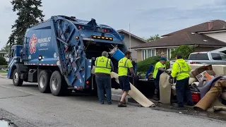 Republic Services Rear Loader Garbage Truck Packing a Giant Bulk Pile