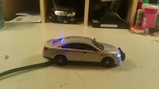 1/43 Ford Taurus Police car with working lights and siren