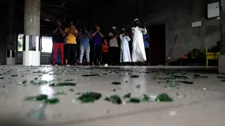 Defiant Sri Lankan Muslims pray inside destroyed mosque