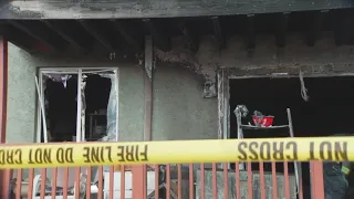 Video shows officers evacuate residents from deadly fire