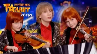 Young brothers playing beautiful melody on Ukraine's Got Talent.