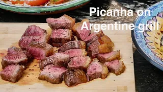 Picanha on open fire Argentine grill (Fly Me to the Moon)